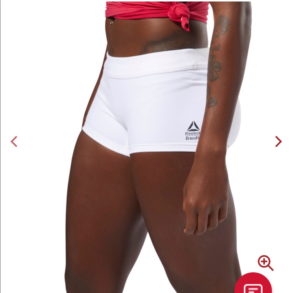 Reebok white booty shorts/S
NWT